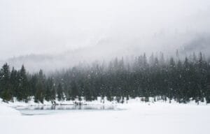 Winter home with snow covered roof